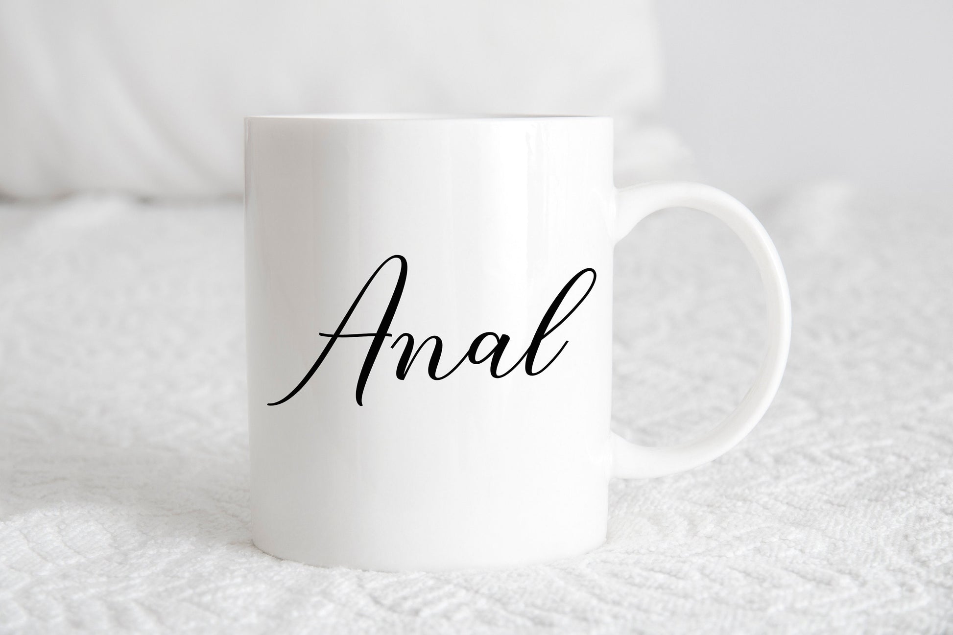 Anal coffee mug with bold black text on white ceramic