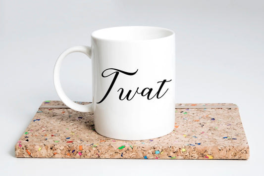 Twat coffee mug with bold, funny text on white ceramic
